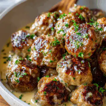 Easy Garlic Butter Meatballs served over creamy