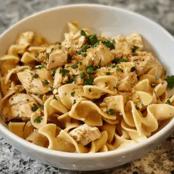 Chicken Buttered Noodles taken with iphone 15 pro max --iw 2 --ar 4:5 --v 6.0 --raw