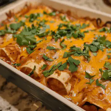 Chicken Enchiladas taken with iphone 15 pro max --iw 2 --ar 4:5 --v 6.0 --raw