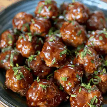 Honey BBQ Meatballs taken with iphone 15 pro max --iw 2 --ar 4:5 --v 6.0 --raw