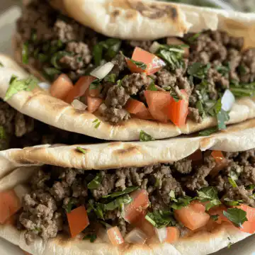Mediterranean Ground Beef Pita Pockets (Lunch Idea) taken with iphone 15 pro max --iw 2 --ar 4:5 --v 6.0 --raw