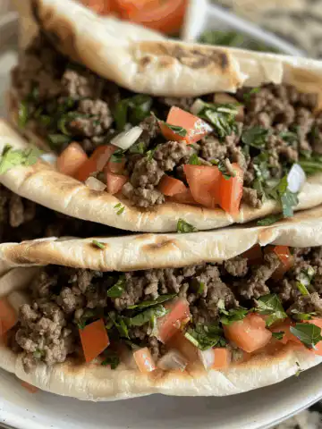 Mediterranean Ground Beef Pita Pockets (Lunch Idea) taken with iphone 15 pro max --iw 2 --ar 4:5 --v 6.0 --raw