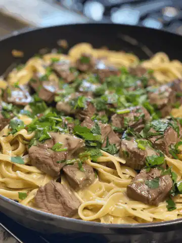 One-Pot Creamy Spicy Garlic Butter Steak & Pasta taken with iphone 15 pro max --iw 2 --ar 4:5 --v 6.0 --raw