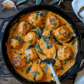 Pumpkin Chicken Meatballs in Sage Cream Sauce - Spice Up Bites taken with iphone 15 pro max --iw 2 --ar 4:5 --v 6.0 --raw