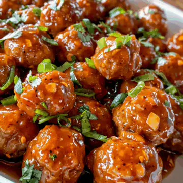 Sweet Chili Meatballs taken with iphone 15 pro max --iw 2 --ar 4:5 --v 6.0 --raw