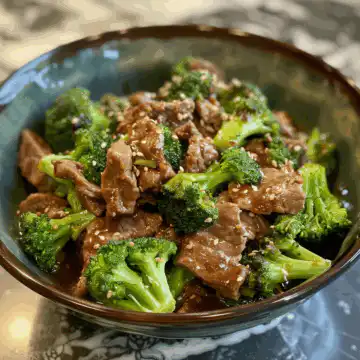 Ultimate Beef and Broccoli Delight taken with iphone 15 pro max --iw 2 --ar 4:5 --v 6.0 --raw