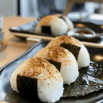 Easy Japanese Tuna Onigiri taken with iphone 15 pro max --iw 2 --ar 4:5 --v 6.0 --raw