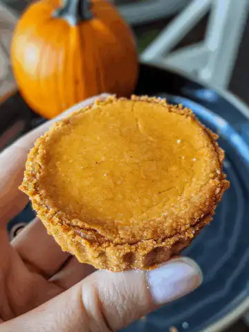 Mini Cheese Cracker Pumpkin Pie taken with iphone 15 pro max --iw 2 --ar 4:5 --v 6.0 --raw