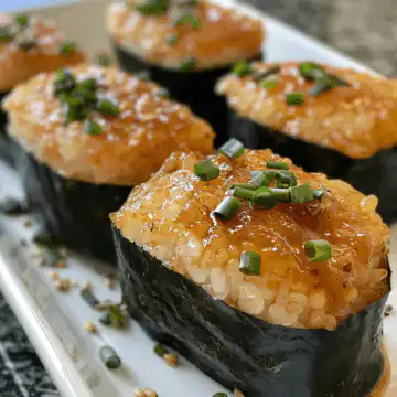 Spicy Tuna Onigiri taken with iphone 15 pro max --iw 2 --ar 4:5 --v 6.0 --raw