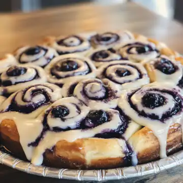 Blueberry Cinnamon Rolls Recipe taken with iphone 15 pro max --iw 2 --ar 4:5 --v 6.1 --raw