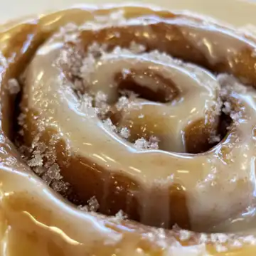 Cinnamon Roll Cake Recipe taken with iphone 15 pro max --iw 2 --ar 4:5 --v 6.1 --raw