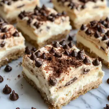 Crowd-Pleasing Cannoli Squares Recipe taken with iphone 15 pro max --iw 2 --ar 4:5 --v 6.1 --raw