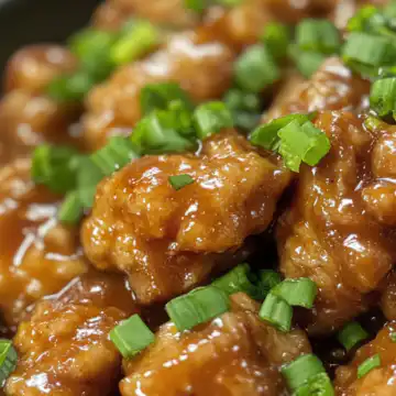 Food Court Bourbon Chicken Copycat Recipe taken with iphone 15 pro max --iw 2 --ar 4:5 --v 6.1 --raw