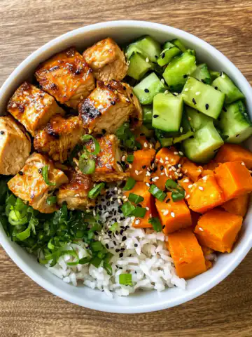 Healthy Chicken & Sweet Potato Rice Bowl Recipe taken with iphone 15 pro max --iw 2 --ar 4:5 --v 6.1 --raw