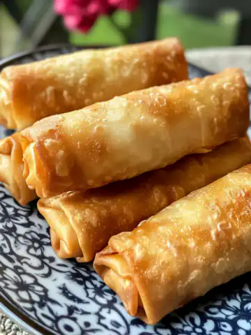 Homemade Cherry Cheesecake Egg Rolls Recipe taken with iphone 15 pro max --iw 2 --ar 4:5 --v 6.1 --raw