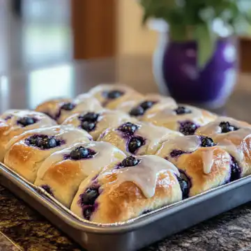 Lemon Blueberry Sweet Rolls Recipe taken with iphone 15 pro max --iw 2 --ar 4:5 --v 6.1 --raw