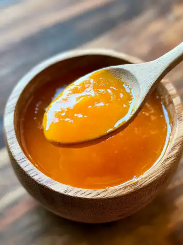 Mango Habanero Honey Garlic Sauce Recipe taken with iphone 15 pro max --iw 2 --ar 4:5 --v 6.1 --raw
