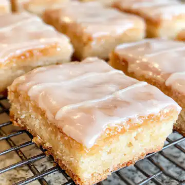 Maple Donut Bars Recipe taken with iphone 15 pro max --iw 2 --ar 4:5 --v 6.1 --raw