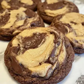 Peanut Butter Brownie Swirl Cookies Recipe taken with iphone 15 pro max --iw 2 --ar 4:5 --v 6.1 --raw
