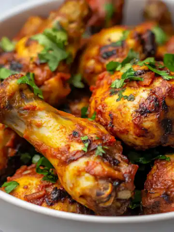 Peri Peri Chicken Recipe taken with iphone 15 pro max --iw 2 --ar 4:5 --v 6.1 --raw