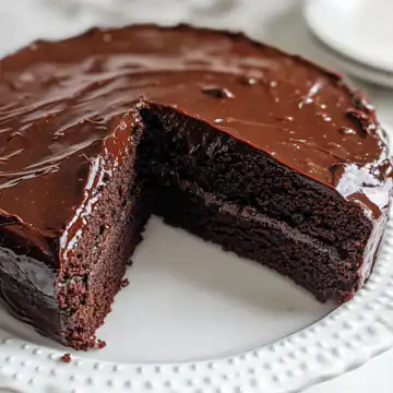 Rich and Moist Chocolate Cake Recipe taken with iphone 15 pro max --iw 2 --ar 4:5 --v 6.1 --raw