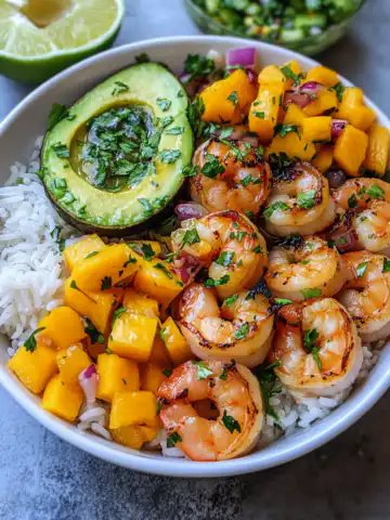 Shrimp and Avocado Bowls with Mango Salsa and Lime-Chili Sauce Recipe taken with iphone 15 pro max --iw 2 --ar 4:5 --v 6.1 --raw