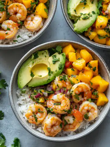Shrimp Avocado Bowls with Mango Salsa Recipe taken with iphone 15 pro max --iw 2 --ar 4:5 --v 6.1 --raw