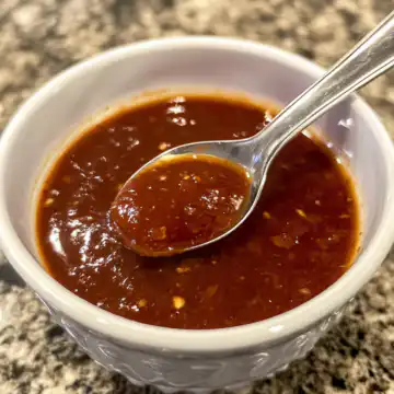 Shut Yo Mouth Sauce Recipe taken with iphone 15 pro max --iw 2 --ar 4:5 --v 6.1 --raw