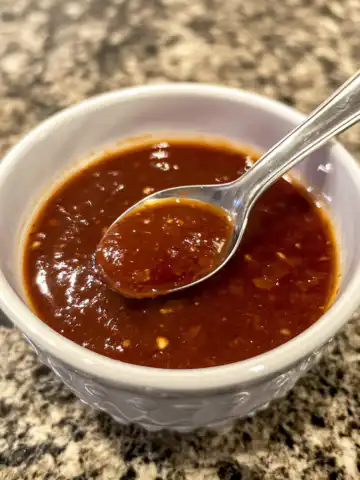 Shut Yo Mouth Sauce Recipe taken with iphone 15 pro max --iw 2 --ar 4:5 --v 6.1 --raw