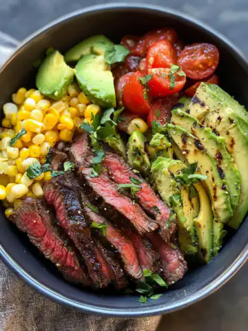 Steak, Avocado & Roasted Corn Bowl Recipe taken with iphone 15 pro max --iw 2 --ar 4:5 --v 6.1 --raw