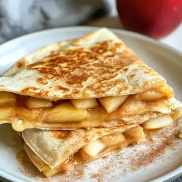 Sweet and Savory Apple Cinnamon Breakfast Quesadillas Recipe taken with iphone 15 pro max --iw 2 --ar 4:5 --v 6.1 --raw